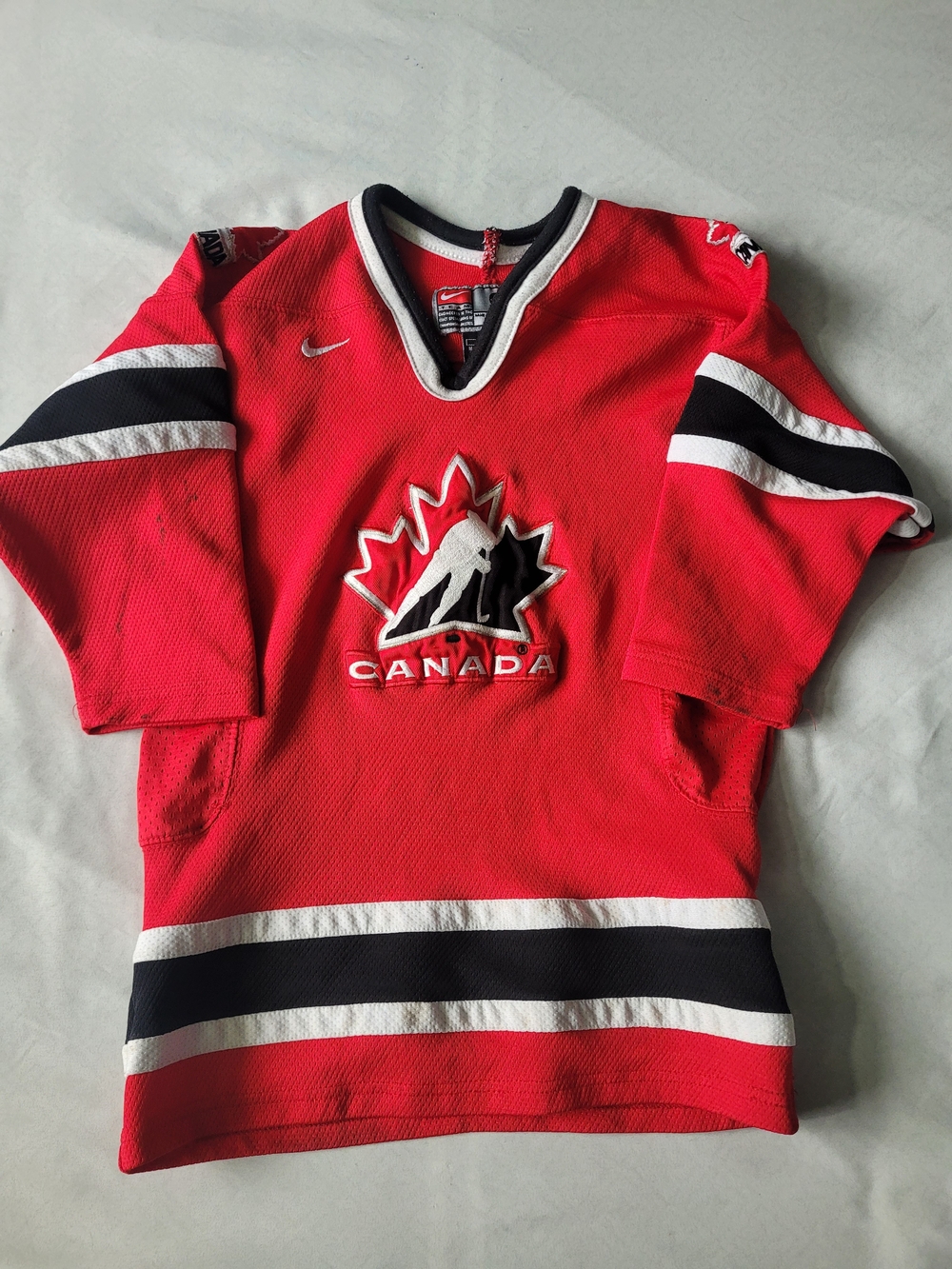 Nike Red Canada Hockey Jersey for Kids with Black & White Trim